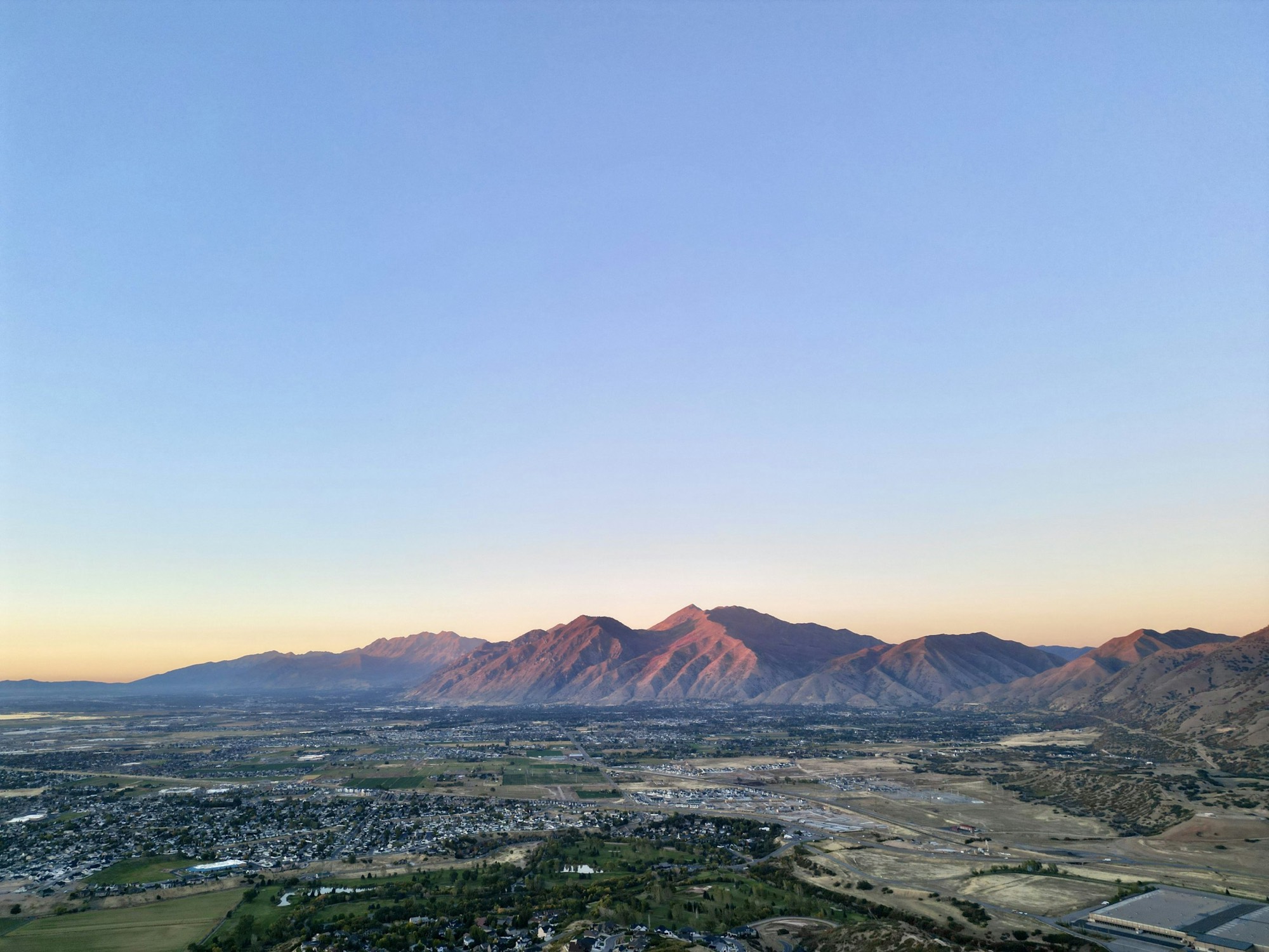 Utah Valley at sunset with the Wasatch Mountains glowing