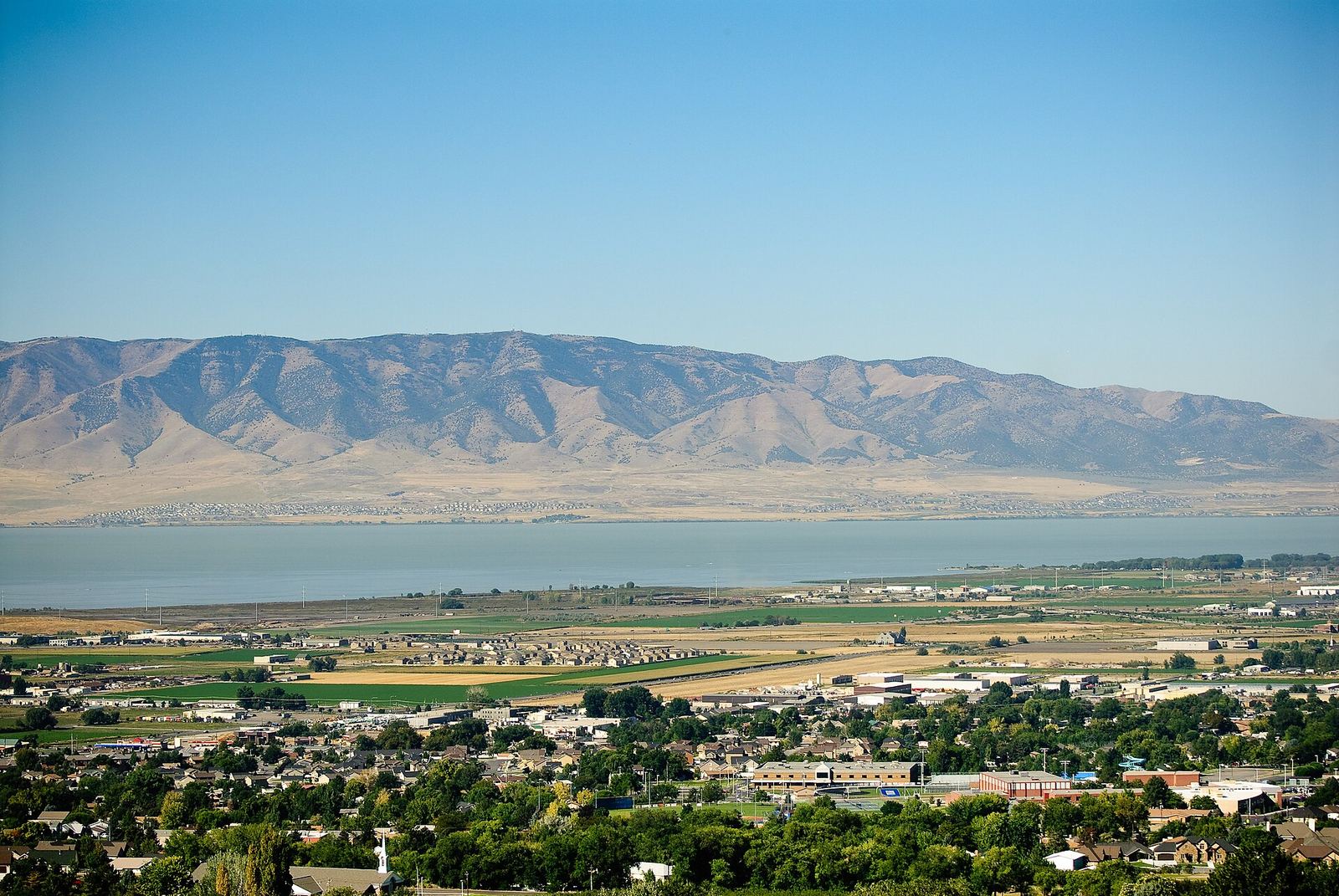 Homes in Pleasant Grove, Utah, seen from the foothills, looking west over Utah Lake