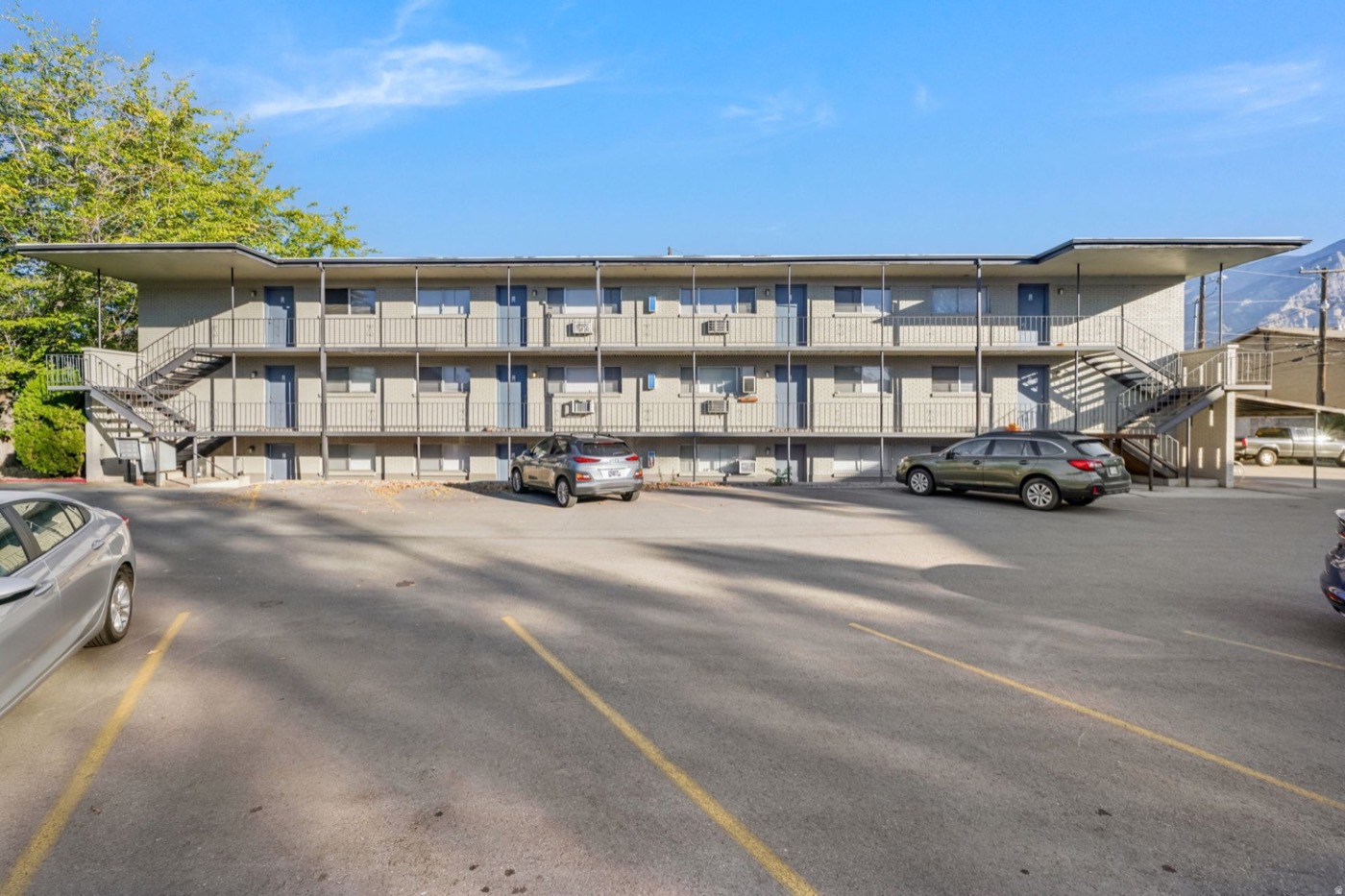 Two-story apartment building with parking